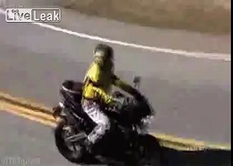 Biker hits railing and falls off a cliff