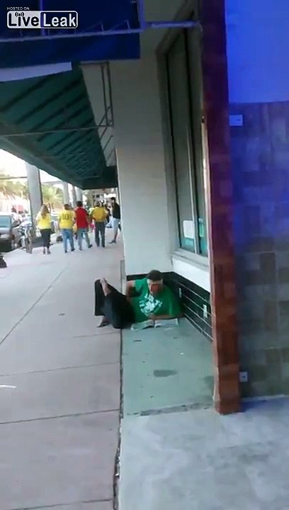 Dude rubbing one out in public in Miami Beach