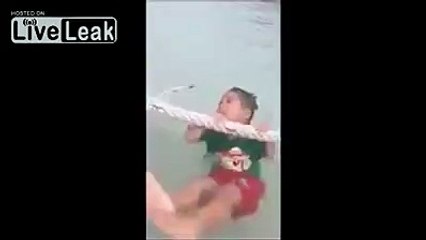 Little kid thinks he is drowning until his sister stand him up