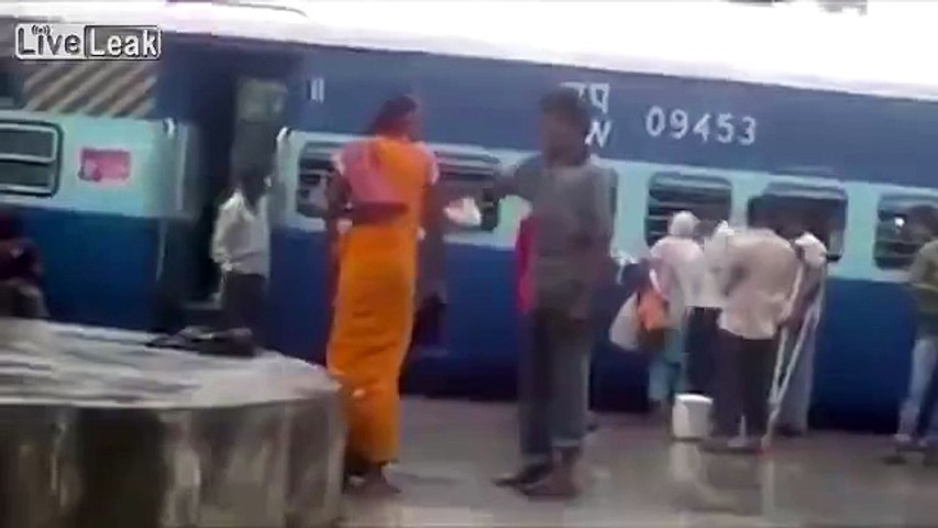 Moment Indian woman body slams man at train station