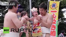Japan: Sumo wrestlers make babies wail for the crying festival