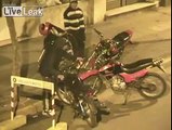 Some dirt balls steals la motocicleta and gets busted by la policia