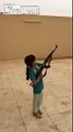 Child Shooting an AK-47 Nearly Kills the Camera Man !