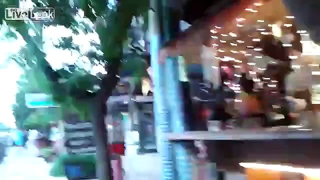 Argentine girl walks through central-european looking town...