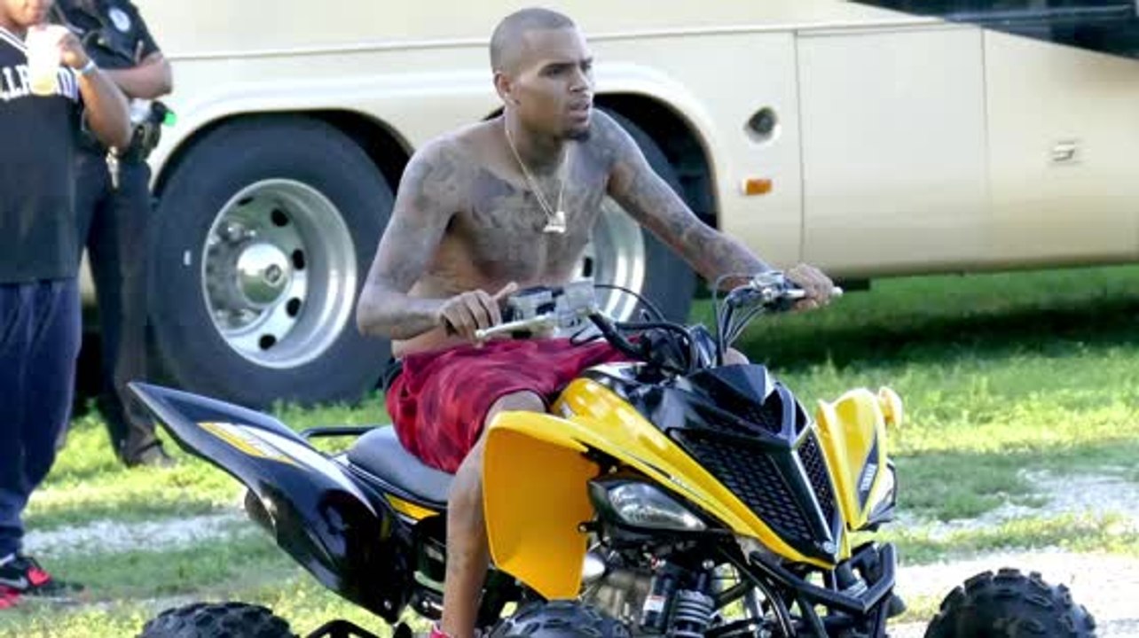 Chris Brown Drives Shirtless in New Video