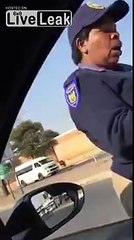 Angry Indian motorist vs. Black Female cop in South Africa