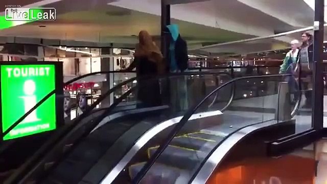 Fresh of the Plane : New Swedish Somalian immigrants trying the escelator!