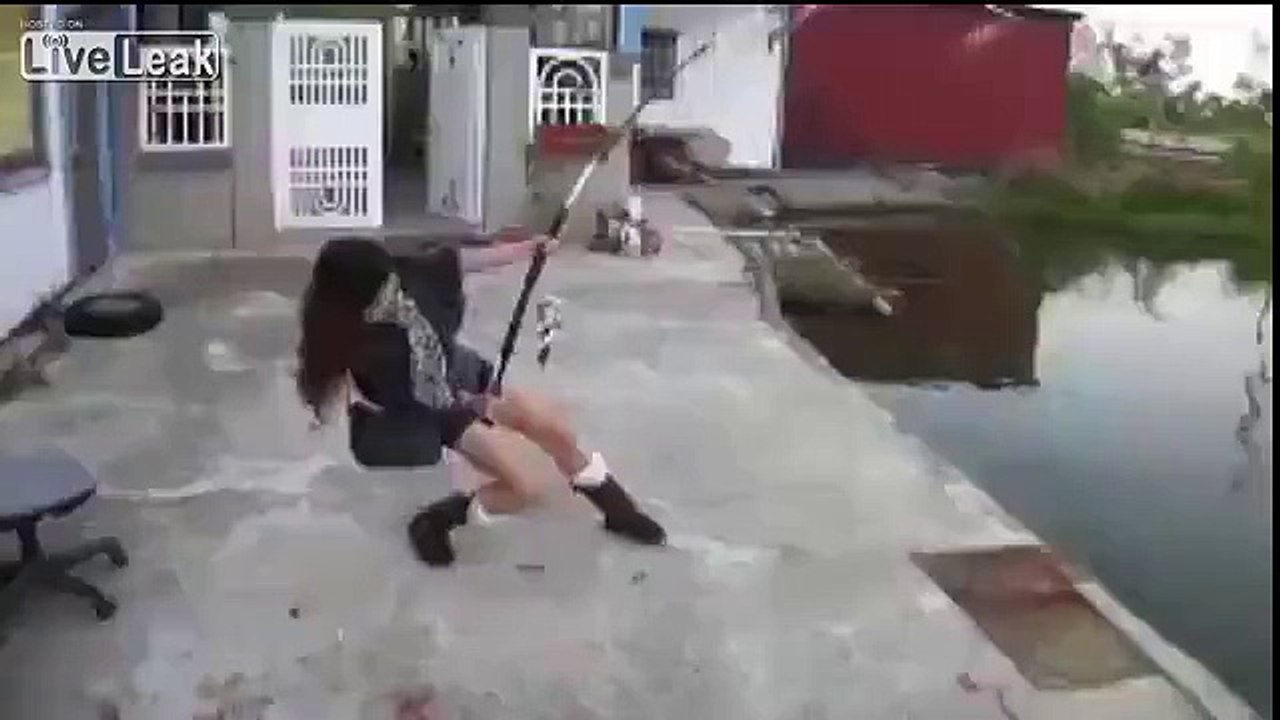 Asian Girl Catches a Huge Fish