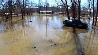 Indiana Residents Wakeboard on Ohio River Flood Water