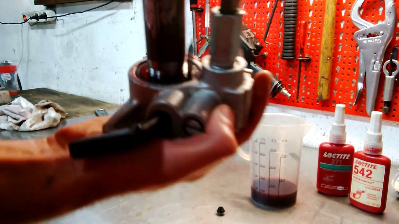faire fonctionner un cric la tête en bas presse hydraulique