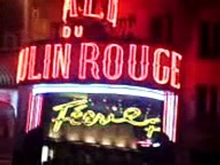 Scottish bagpipes outside Moulin Rouge