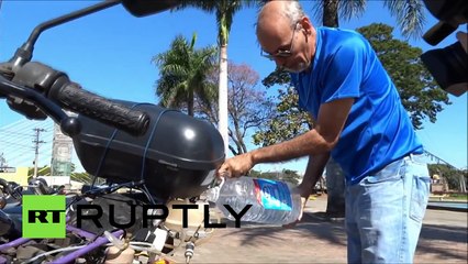 Motorbike that runs on WATER: 1 liter to travel 500km