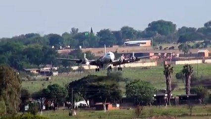 DC6 landing on a grass strip in Pretoria...