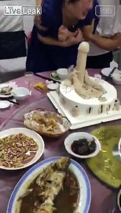 Woman treated with penis cake by co-workers at birthday party for fun