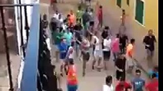 Crowded protection leaves dude face to face with bull