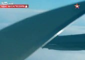 Russian TU 95 bomber followed by NATO planes