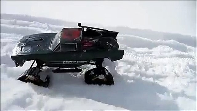 Car, truck cranes, trucks, tanks, toy police car , run on snow