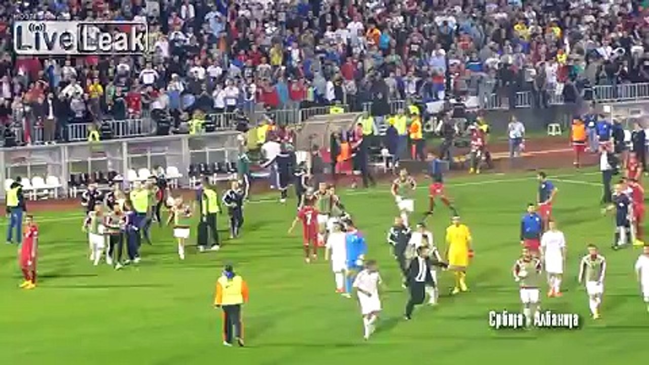 Albanian football players running out of football stadium in Belgrade