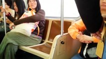 crazy chinese woman argues with crazy homeless man then turn crazy on the bus