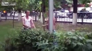 Two Russian Masters Of The Martial Arts Put On A Display In A Public Park.