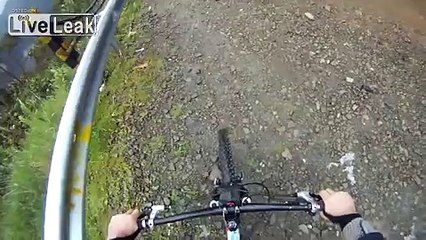 Bike Rider Tries To Base Jump Off Death Cliff -  Bad Idea