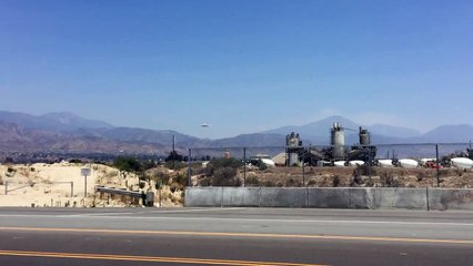 Tanker 10 Landing at San Bernardino Airport after attacking the Lake Fire.