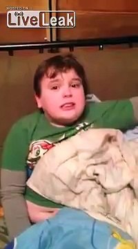 A Kid Crying Over A Video Game Threatens Cameraman With A Kick To The Nut Sack