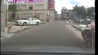 Dashcam Captures Moment - Accident Send Scooter Rider Flying Short Distance