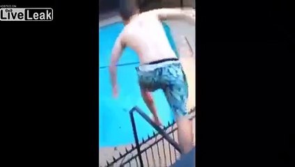Guy jumps over spiked fence and fails emphatically