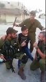 Israeli IDF soldiers teach Palestinian Arab kid a song