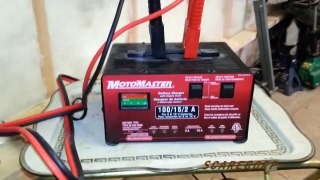 MotoMaster Battery Charger -Boosting Car