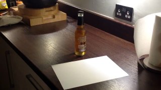 How to open a bottle of beer with a sheet of paper