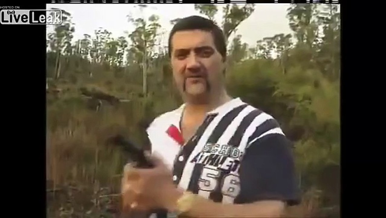 Chopper Reid plays Russian roulette with a reporter