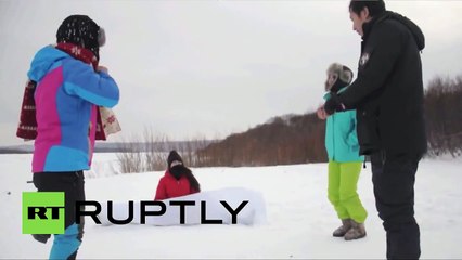 Bikini girls pole dance in minus 50 degree winter weather in China