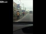 Thai Trucker Takes Out A Few Vehicles And Gets Beat Up And Knocked Out For His Troubles.