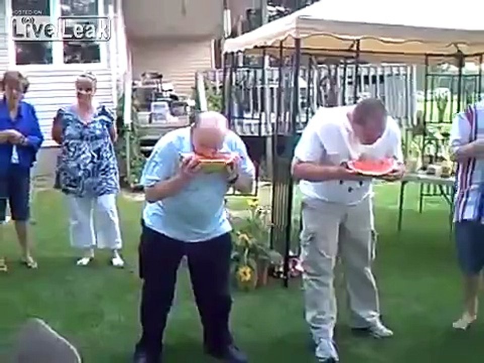 WTF...BLACK WOMAN IN ....Watermelon eating contest.....beats all