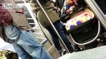 Crappy parenting on display on a NYC Subway Train
