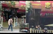 Browned off! Shoppers covered in poop after overfilled septic tanker explodes all over busy Chinese street