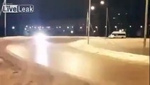 Mini-bus Driver handles icy road like a pro..