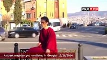 A street magician gets owned and humiliated in Georgia LOL