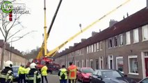 Crane destroys House after failed Marriage Proposal.