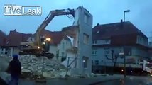 German Safety Fail: Falling wall barely misses biker