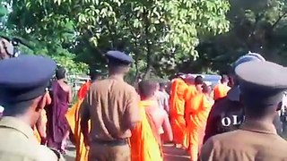 Police Charge Buddhist Monks