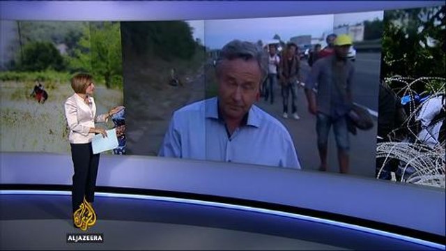 Refugees take to Austria by foot after Hungary blocks trains