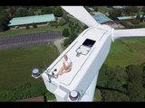 Drone pilot spots man sunbathing on top of wind turbine 200ft above ground