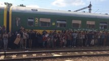 Post reporter shows scene among migrants in Hungary, arrival in Austria