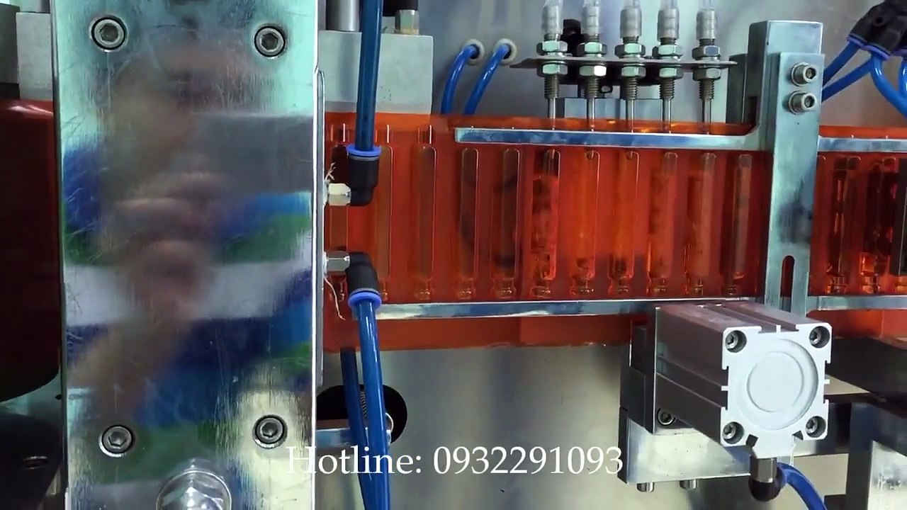 Máy chiết, ép vỉ siro, thuốc nước, dung dịch 5 vòi và dán nhãn tự động