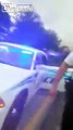 Black man arrested for hitting bonnet of police car, resisting arrest with 20 officers at the scene