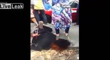 Alleged Thief Is Hog Tied And Given Some Street Justice Before The Police Take Him Away.