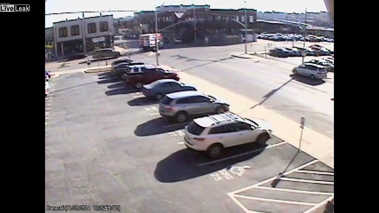 SUV Crashes into Brick Building